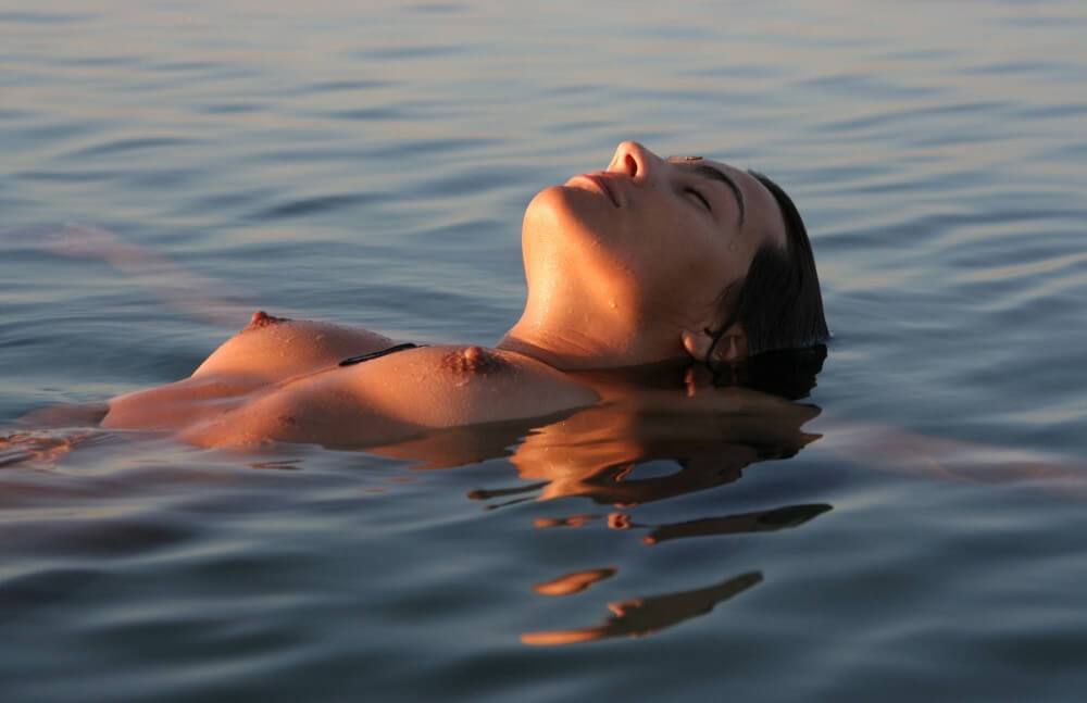 Sunlight Water to the Night pics - Supporters of naturism live in harmony with nature