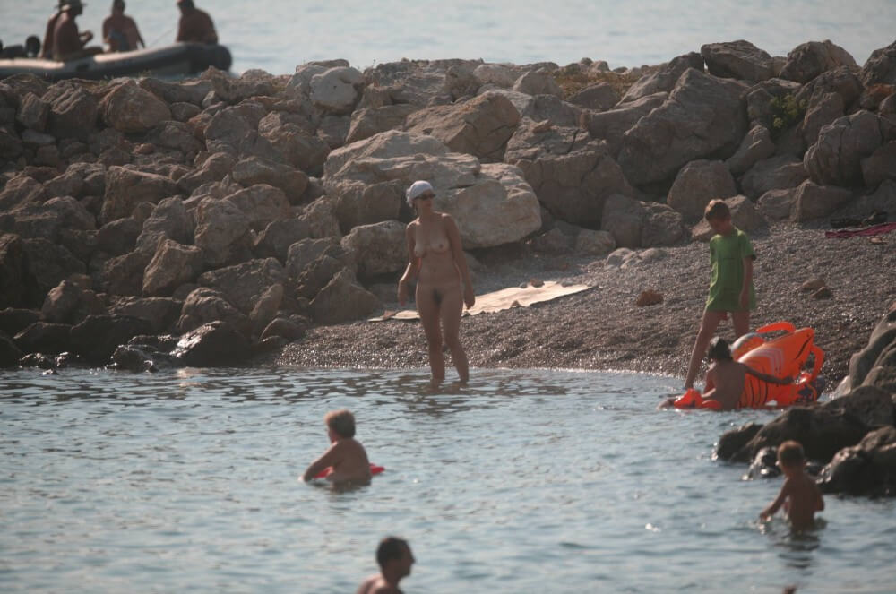 FKK cove pyramid in waters - Ethical Principles of the Nudist Community