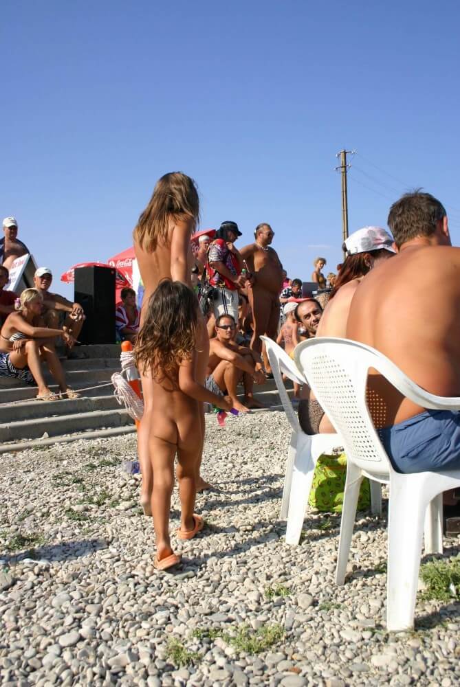 Naturist Standing Sideline - A nudist values trust and friendliness among people