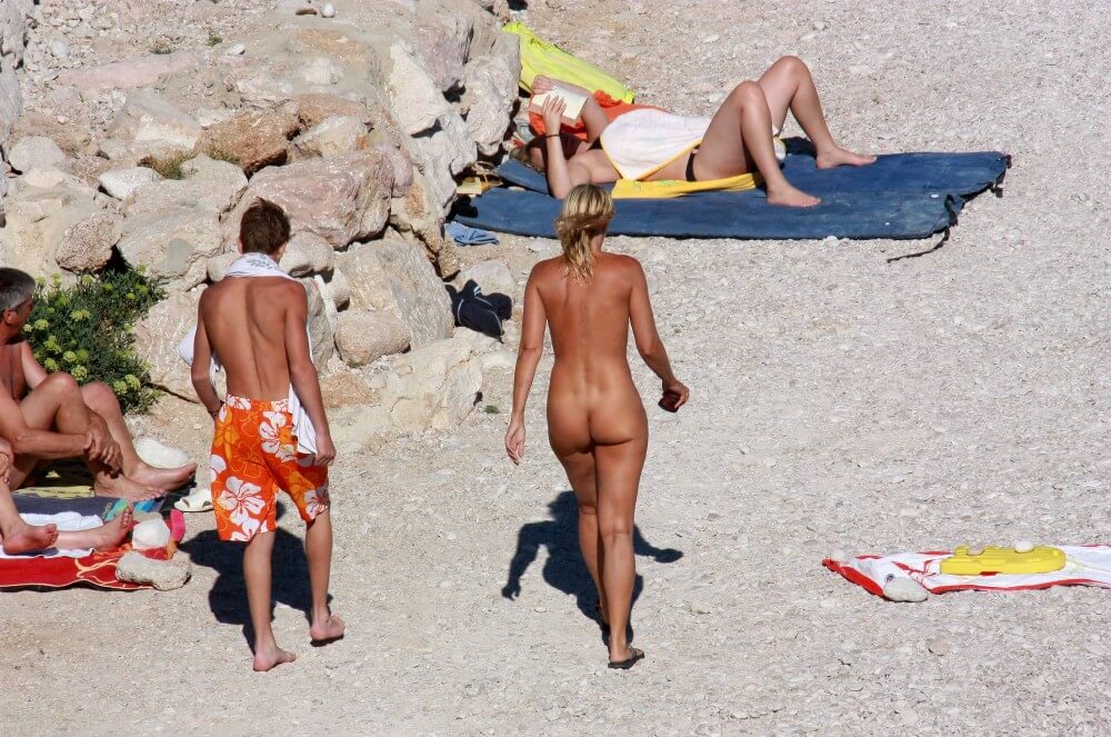 European Beach Entrance pics - People seek in nudism a way to overcome their insecurities