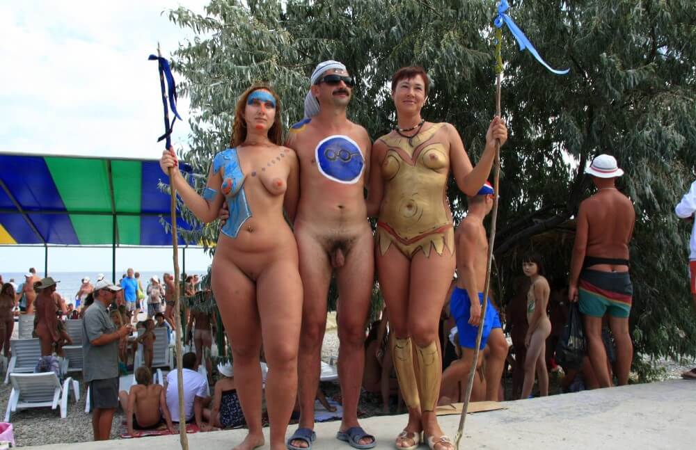 Three Painted Girl Poses pics - Undressing is permissible only within ones own community