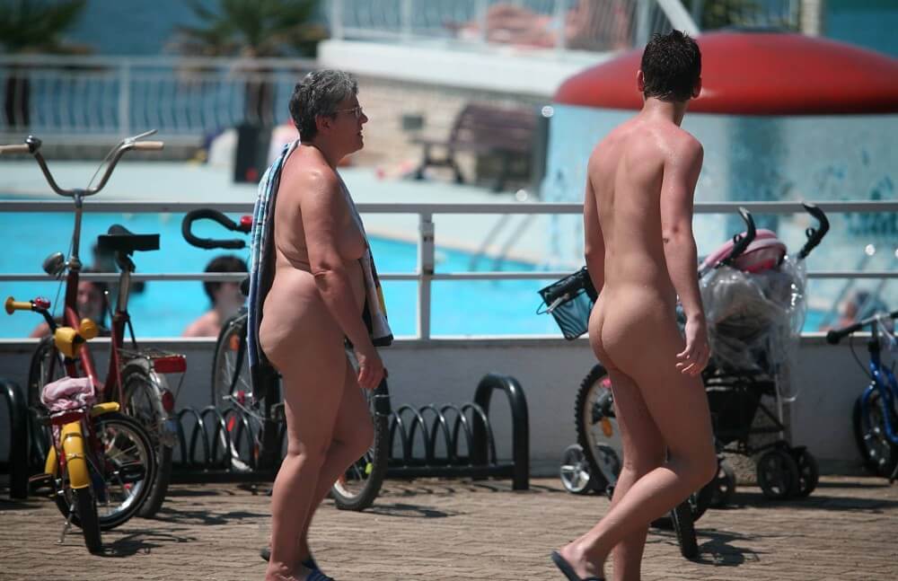 Sun-Soaked Sidewalk pics - Boundaries disappear in the world of nudism