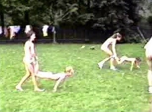 A nudist gathering at the stadium and sports - The naked body is an expression of freedom