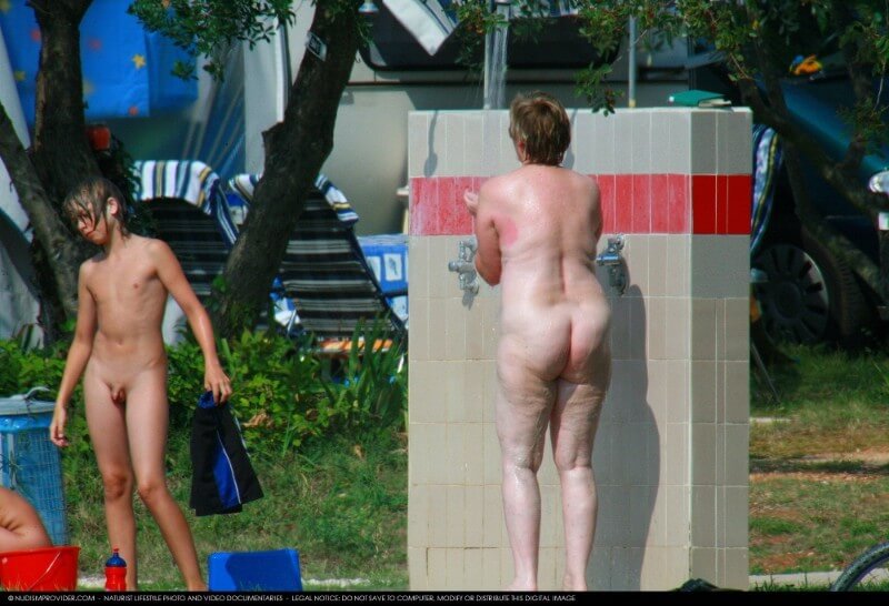 Covered in Towel Nudists-Boardwalk Biking - They value respect for nature and the fully naked body