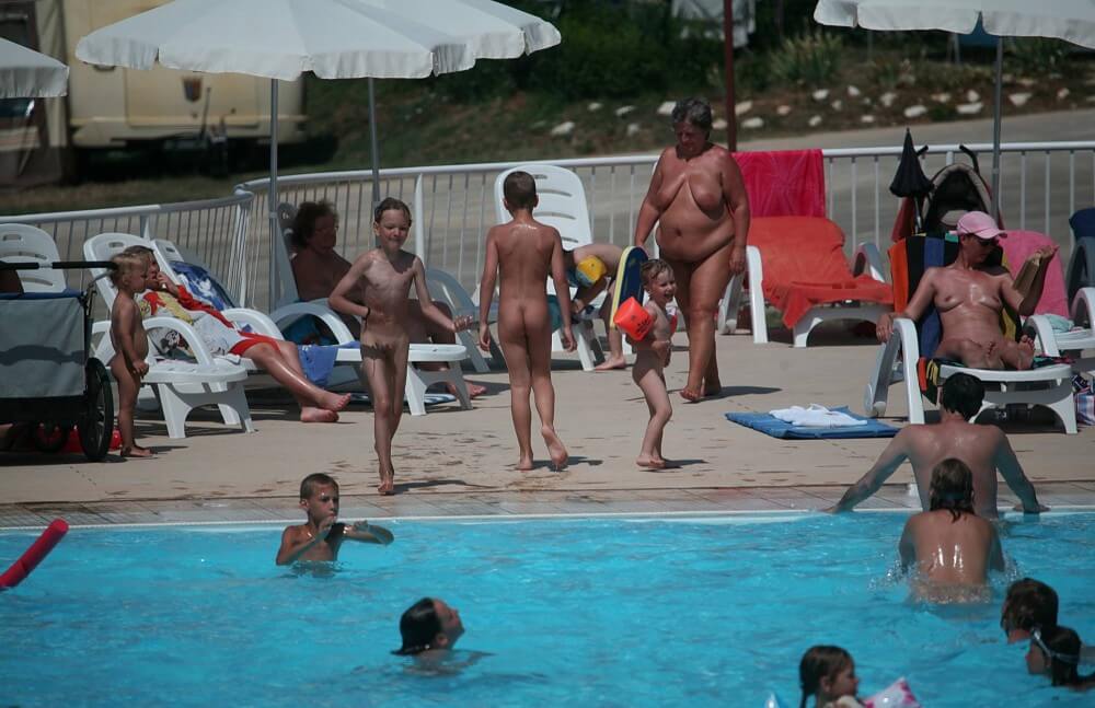 Naturist Afternoon Pool Games pics - Freedom from clothing is an integral part of naturism