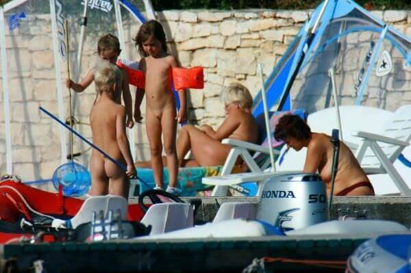 By the boat photos - Naturism is connected to self-love and love of nature